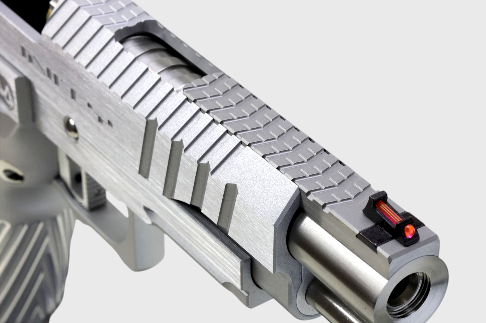 Barrel close-up of Infinity Retro Performance 5.1 Silver airsoft pistol with Sight Tracker for ultimate IPSC precision by Gunsmith Bros